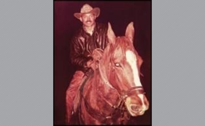 Photo of Everett Heindselman on a horse.