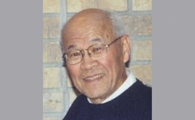 Photo of George Migaki in glasses.