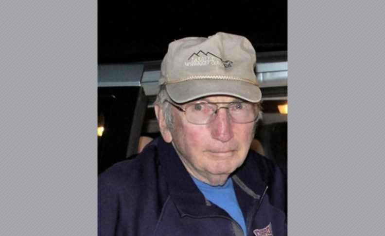 Tim Slobojan wearing hat and glasses.