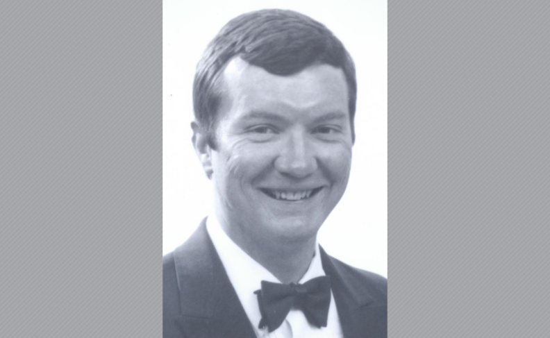 Black and white headshot of Scott Wendling wearing a tuxedo.