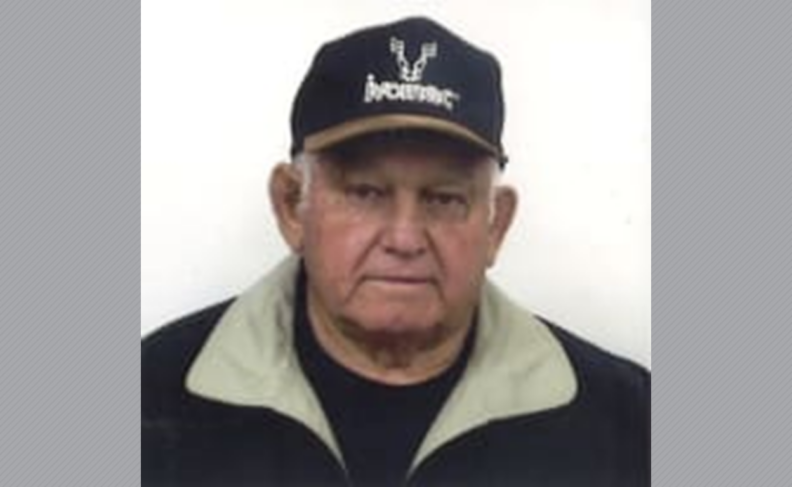Photo of Dr. Widdison in black ball cap.