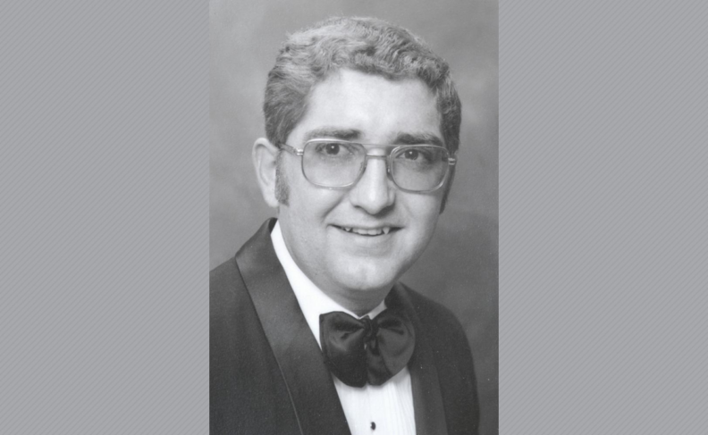 Black and white photo of Dr. Gregg wearing glasses.