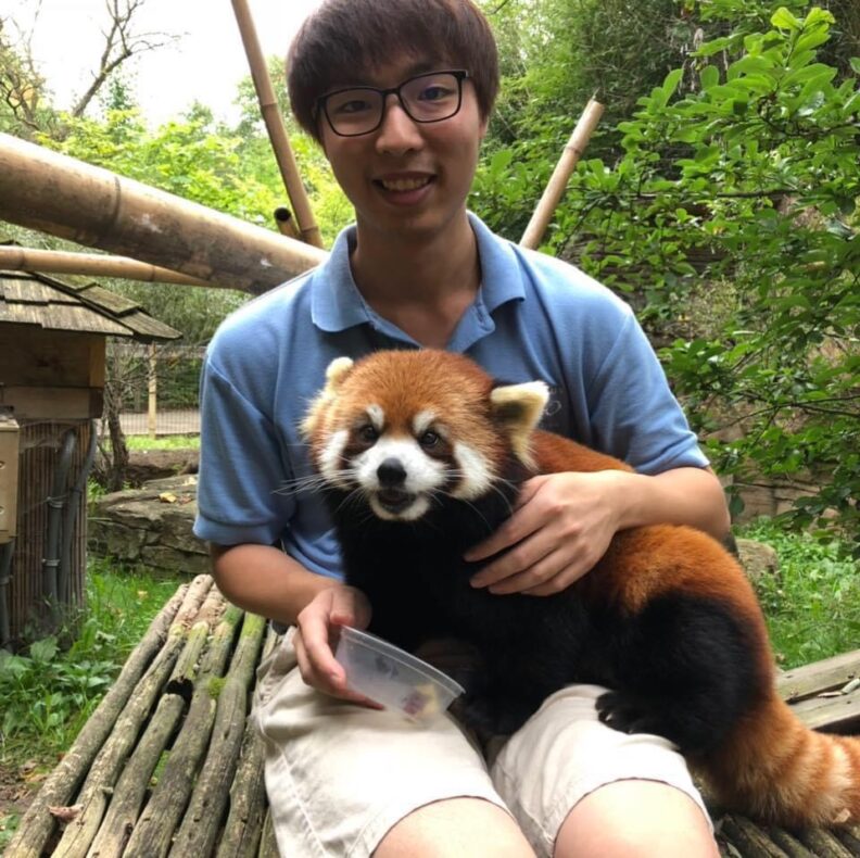 DVM student Brooklynn Balic stands with a cow