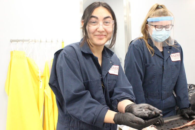 DVM student Maya Boyle holds a fish egg