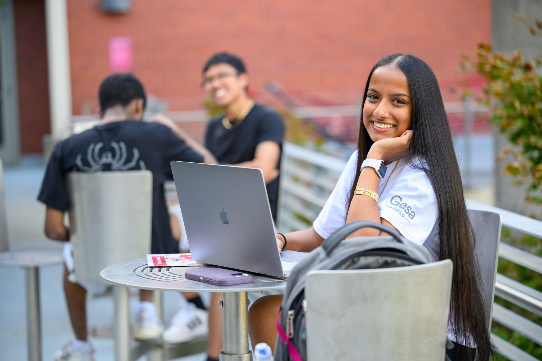 Students study in an outdoor space on the campus of Washington State University