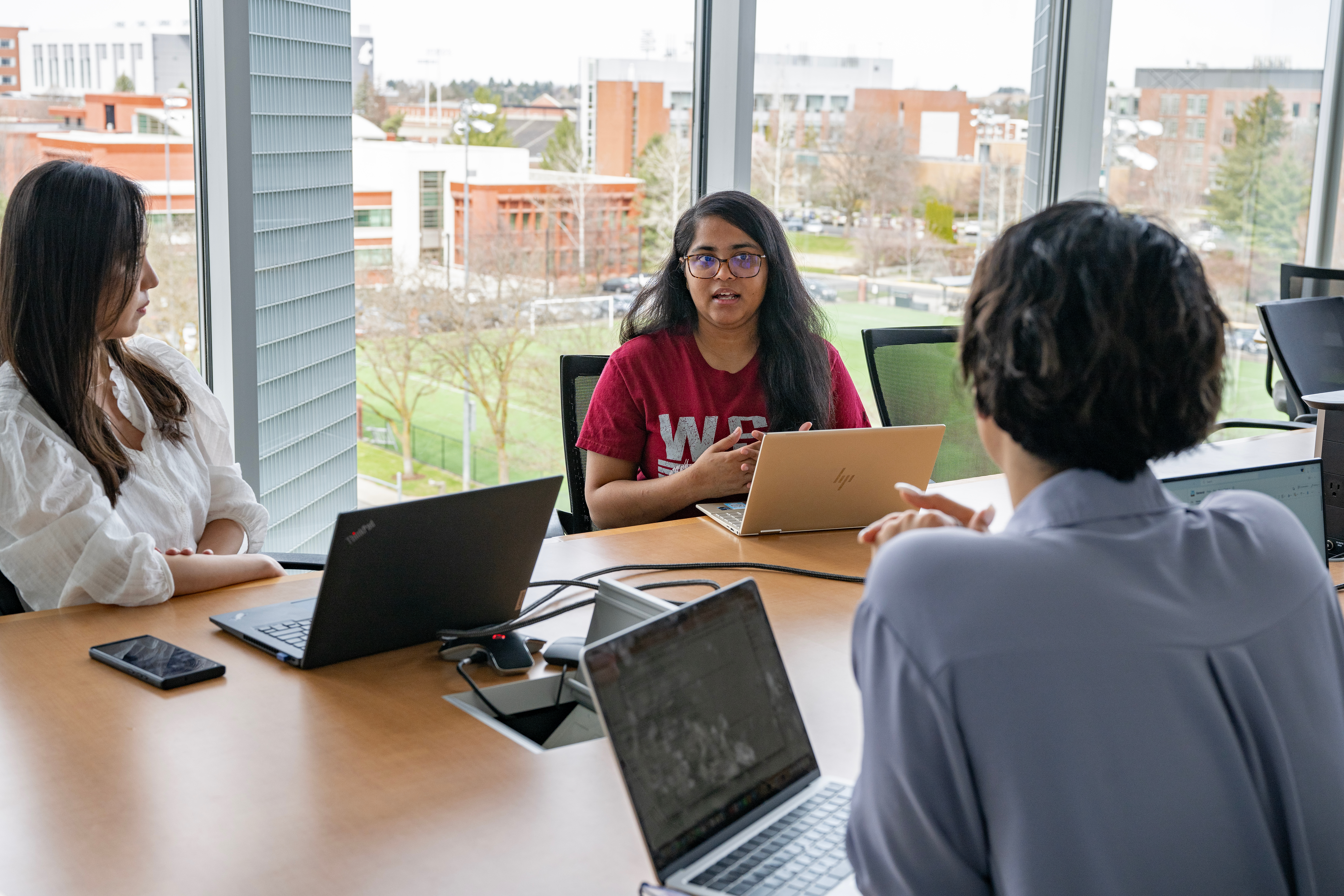 VCEA Graduate students meet and discuss presentations that help communities plan for wildfires on the campus of Washington State University, Thursday, April 11, 2024.