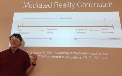 Dr. McMahon presenting on mediated reality continuum. 