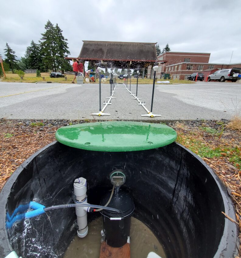 Sprinkler system set up to run a pavement experiment at IDEA high school.