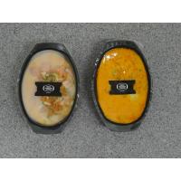 On the left is a meal that has just exited the microwave tunnel. As the steam condenses, a vacuum is created.