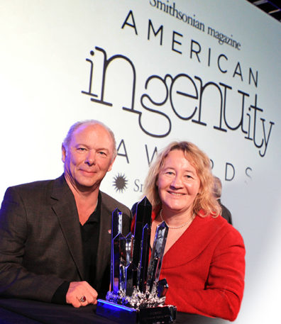 Physical Science award winner Dr. Michael Skinner, left, and Dr. Carol Greider with the award presented by Smithsonian Magazine during the 2nd American Ingenuity Awards Tuesday, Nov. 19, 2013 in Washington. Award winners include Dr. Adam Steltzner, technology; Dr. John Rogers, physical science; Dr. Caroline Hoxby, education; Dave Eggers and Mimi Lok, social progress; Dr. Caroline Winterer, historical scholarship; Doug Aitken, visual arts; Saumil Bandyopadhyay, youth; and St. Vincent, performing arts. (Sharon Farmer/sfphotoworks)