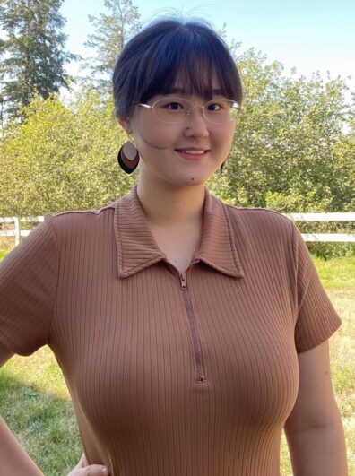 A portrait of Kexin Jiang standing outside.