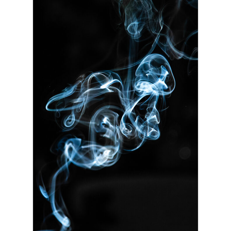 High contrast photograph of billowing smoke.