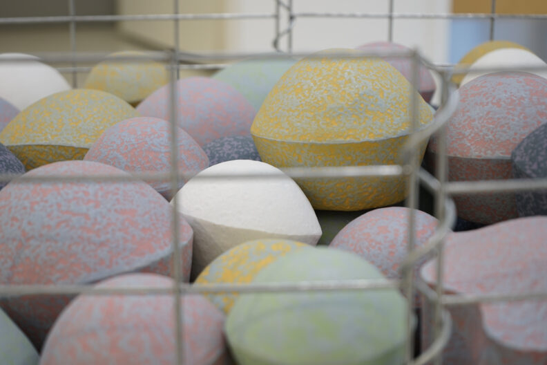 Zoomed in photo of the colorful ceramic pieces in Endless Echo.