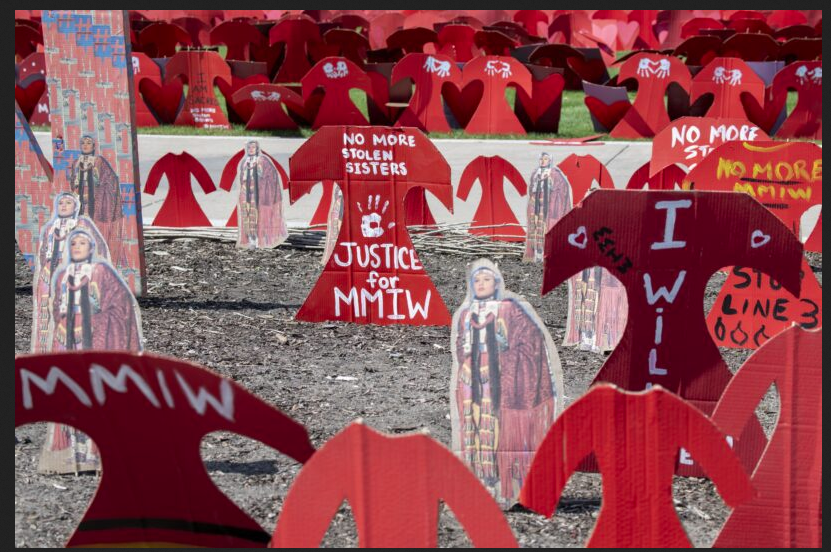 Closeup of multicolored ears of corn.