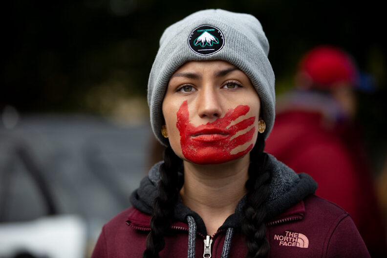 A participant at a “Greater than Fear” march.