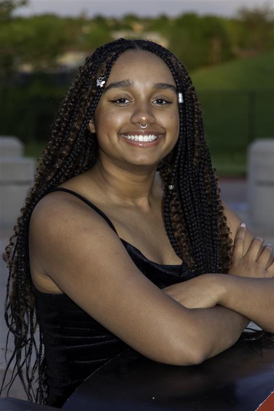 Picture of Ari Wilson (female) smiling.