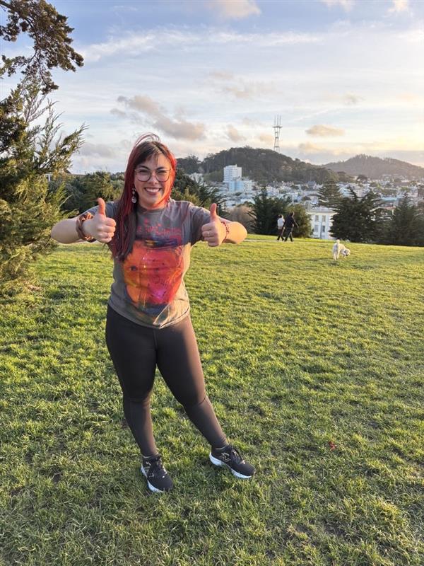 Picture of Anastasia Martinez (female) smiling outside