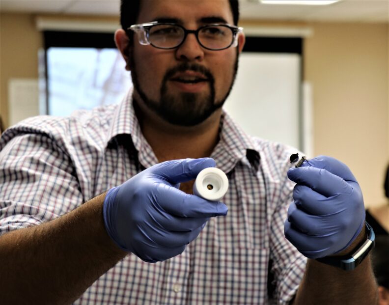 Student presenting an item.