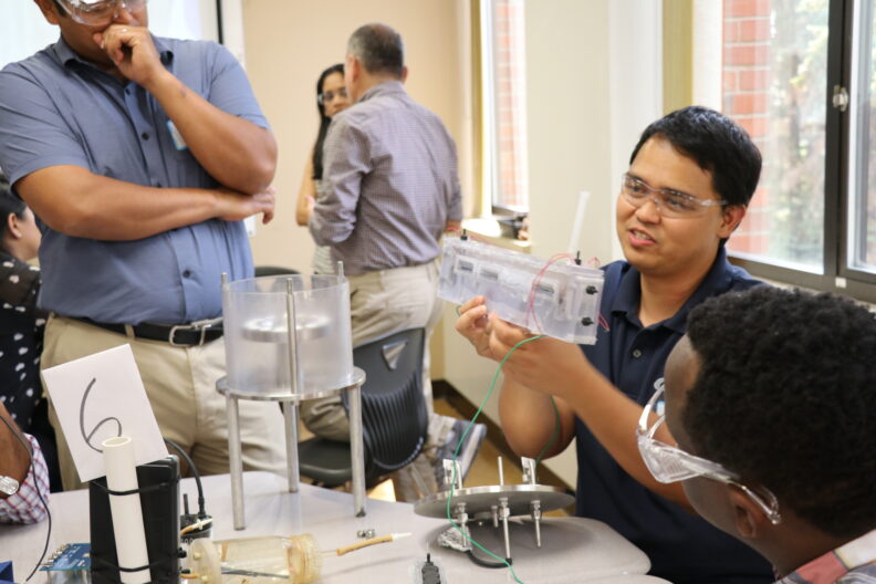 People watching Dr. Jerome Babauta.