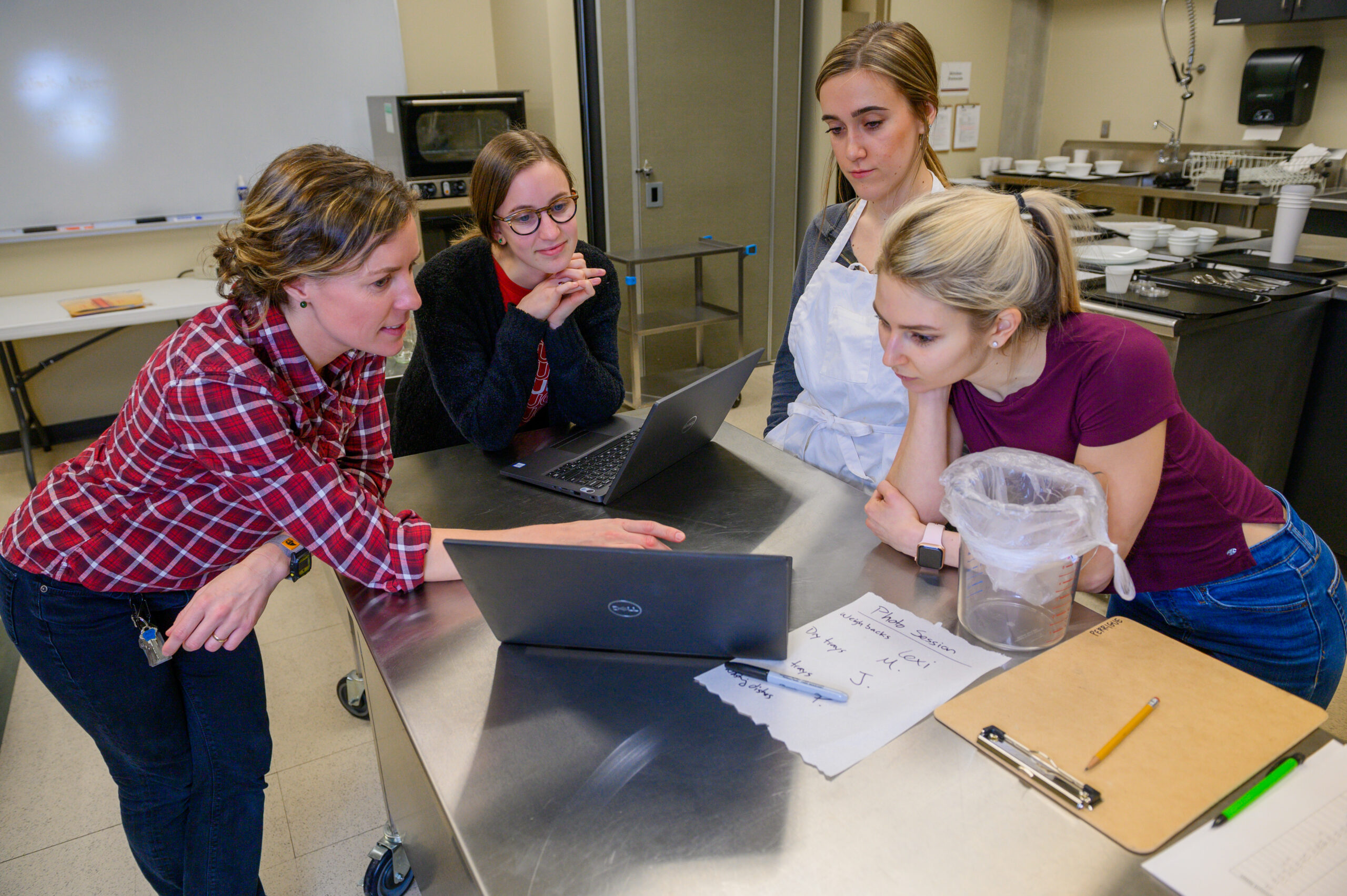 Students doing market research in lob