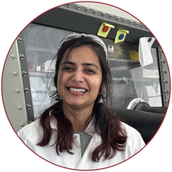 Picture of Palak smiling in front of a glove box