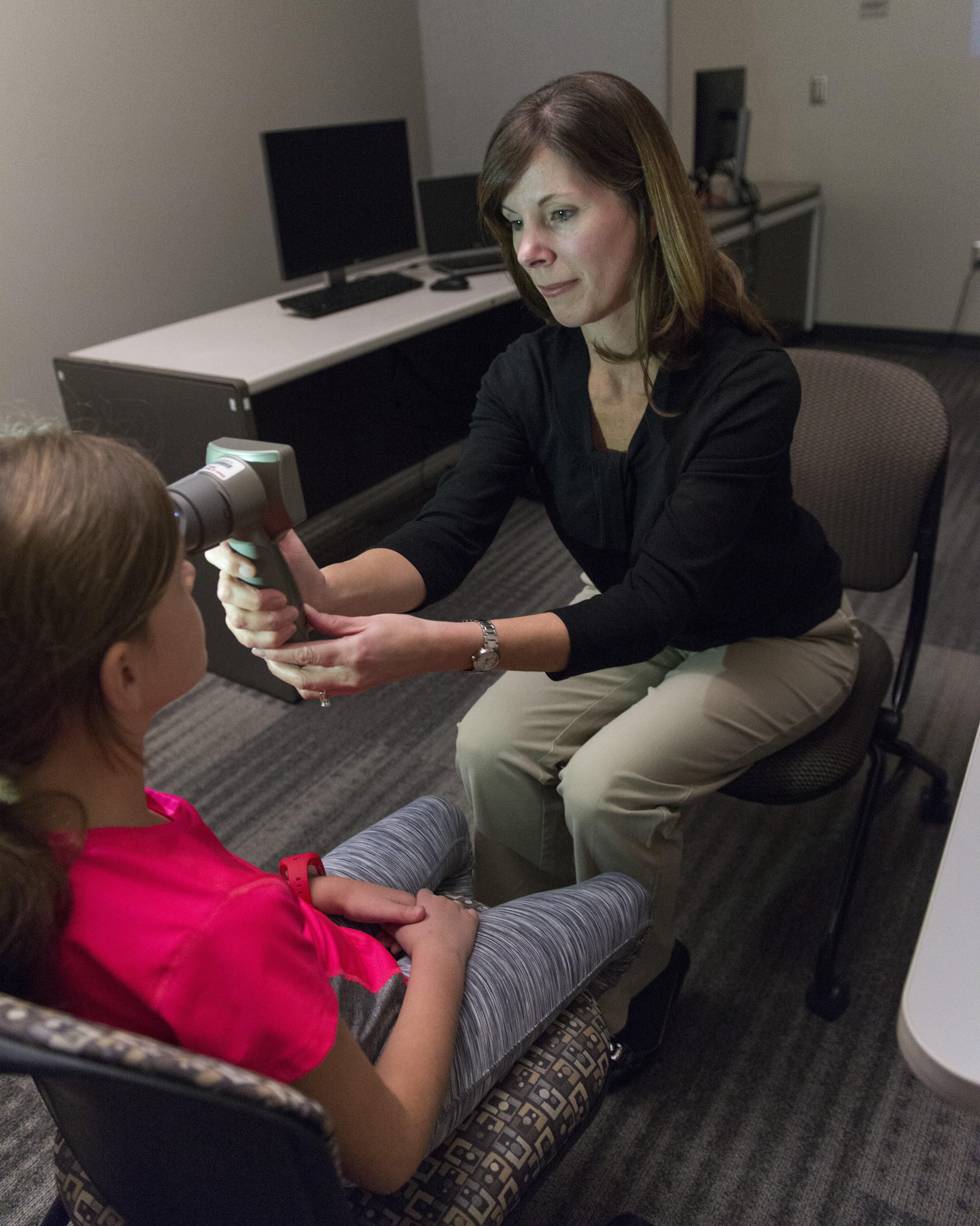 Researcher using Hand-Held Pupillometry
