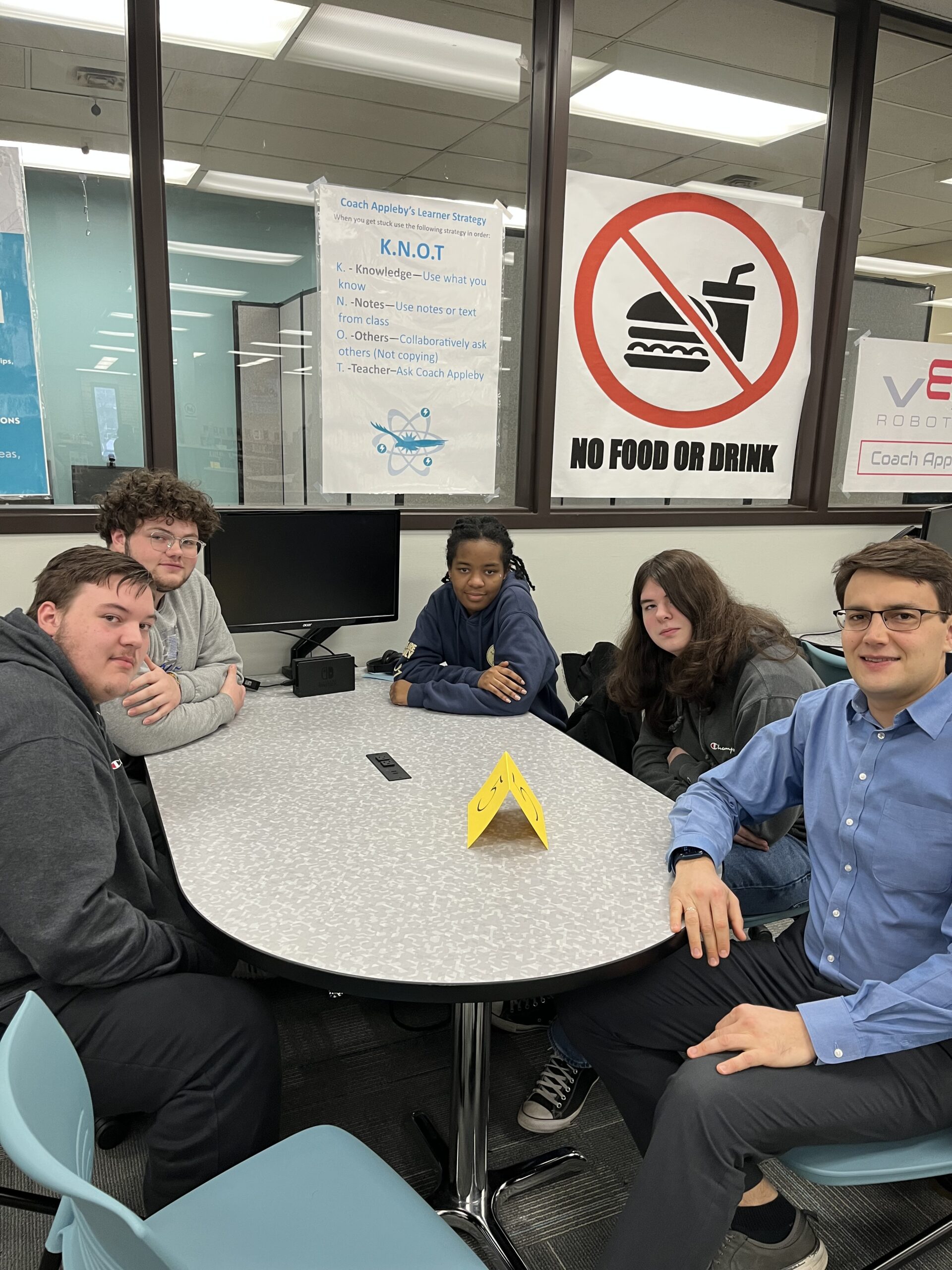A group photo of Dr. Ivan Popov with students from the class of 2023 at the Central Hower high school