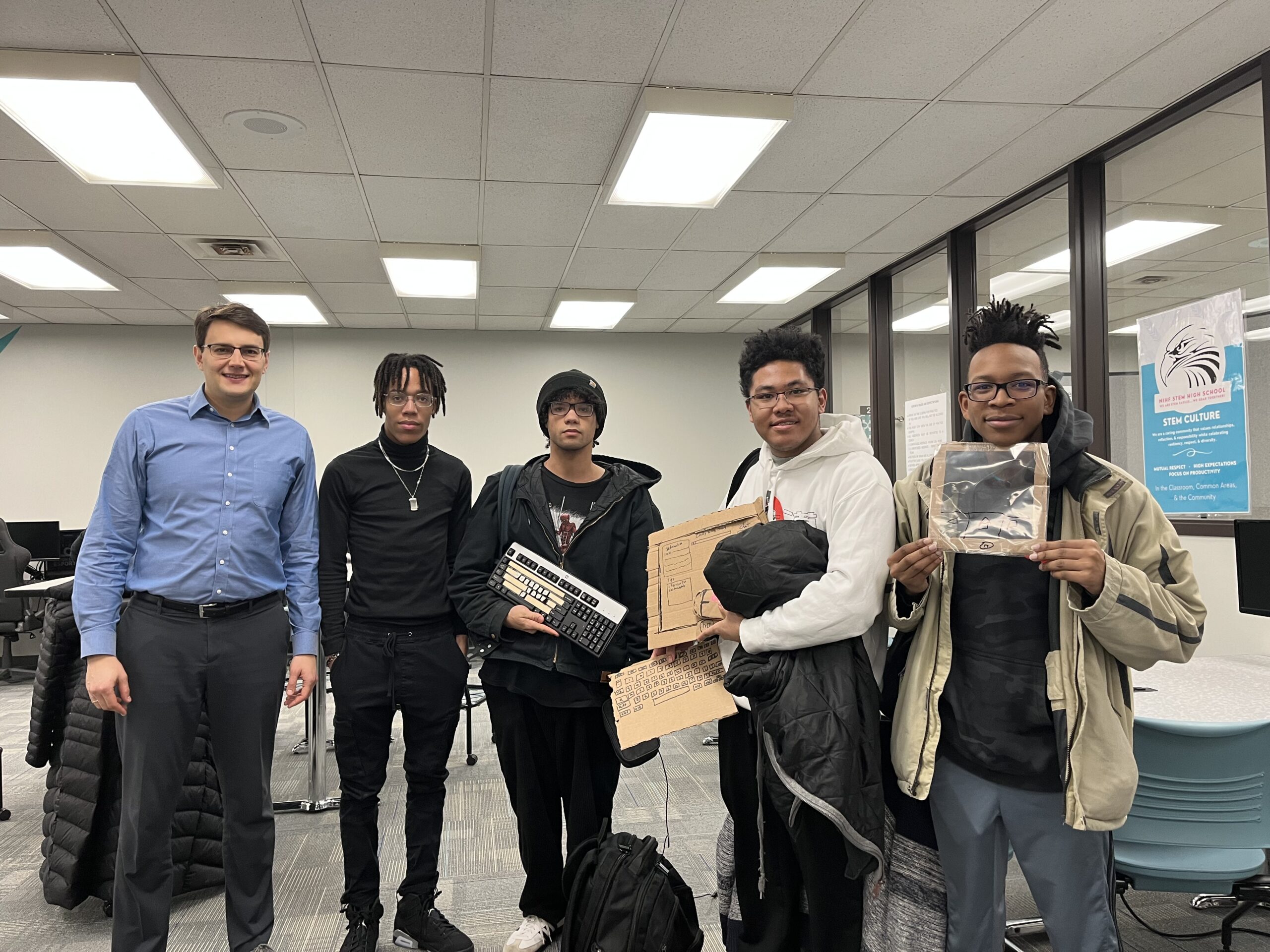 A group photo of Dr. Ivan Popov with students from the class of 2023 at the Central Hower high school