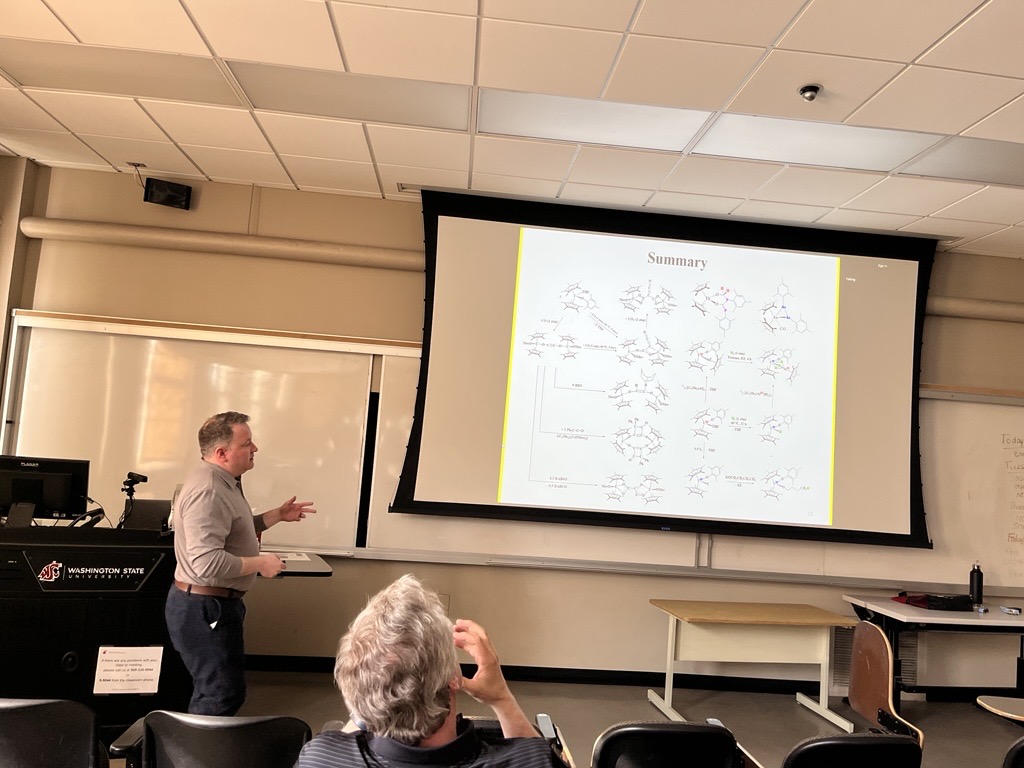Professor Justin Walensky giving the summary for his seminar on small molecule activation with actinide complexes