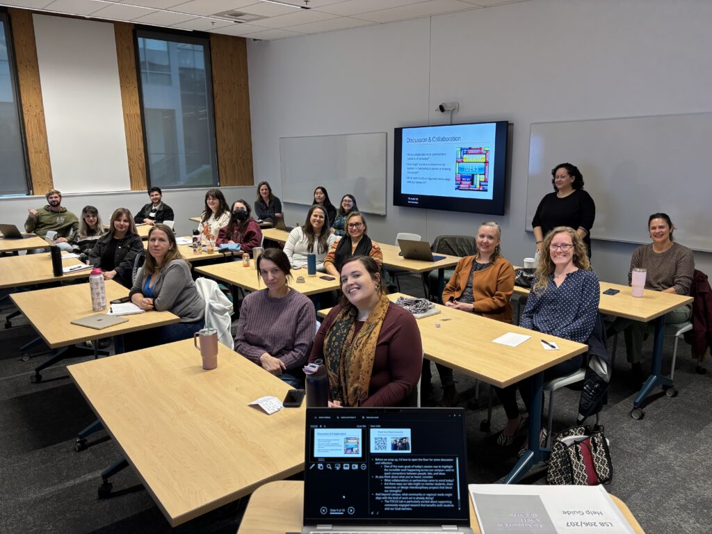 A photo of the FOCUS Lab and guests at research flash talks