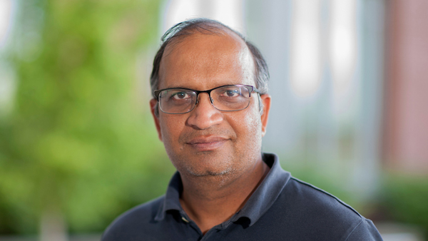 Dr. Thakar outside the building he works in.