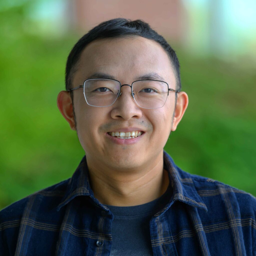 Dr. Shen outside the Biotechnology Life Sciences building.