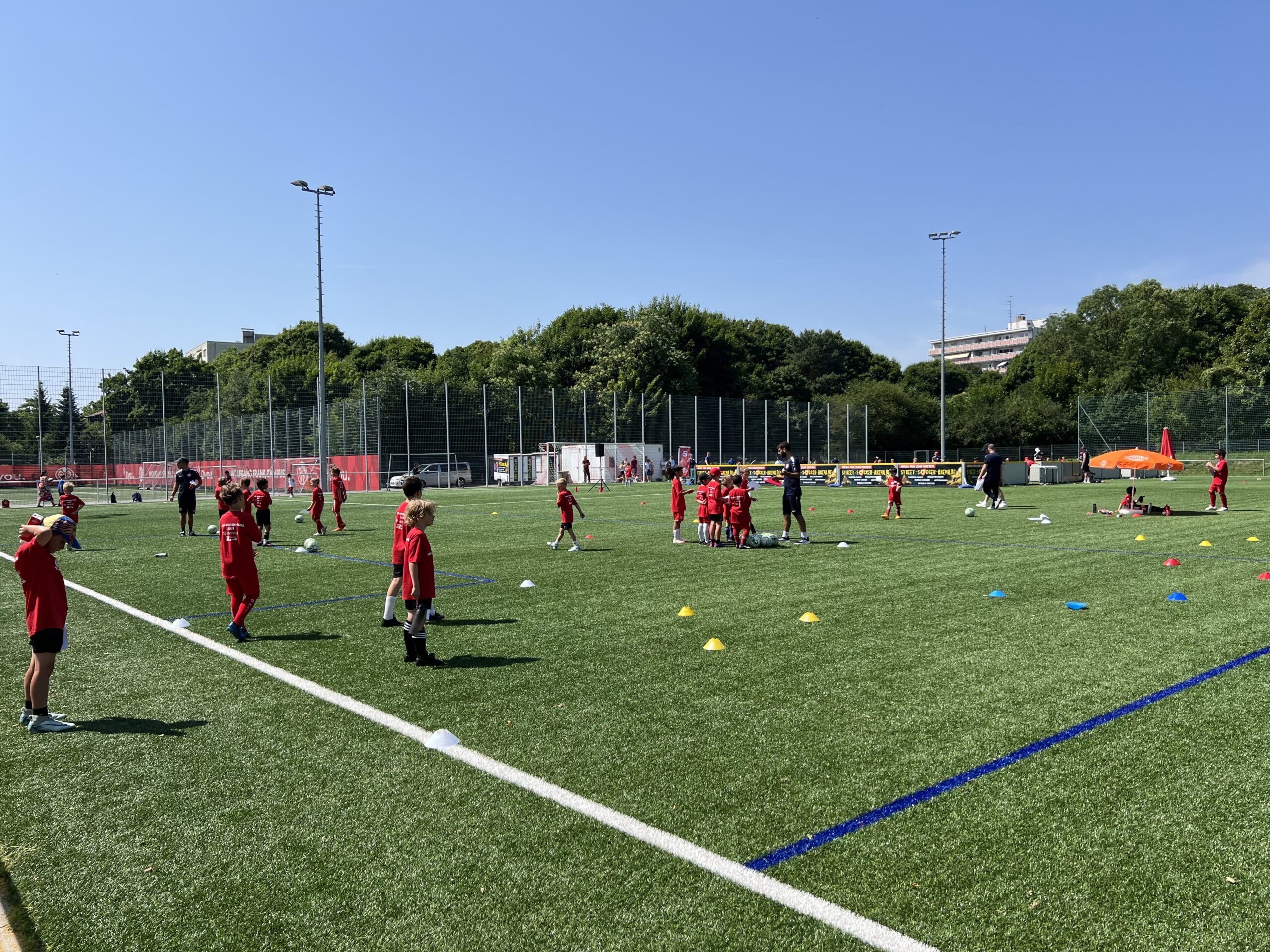 Children playing soccer on a field