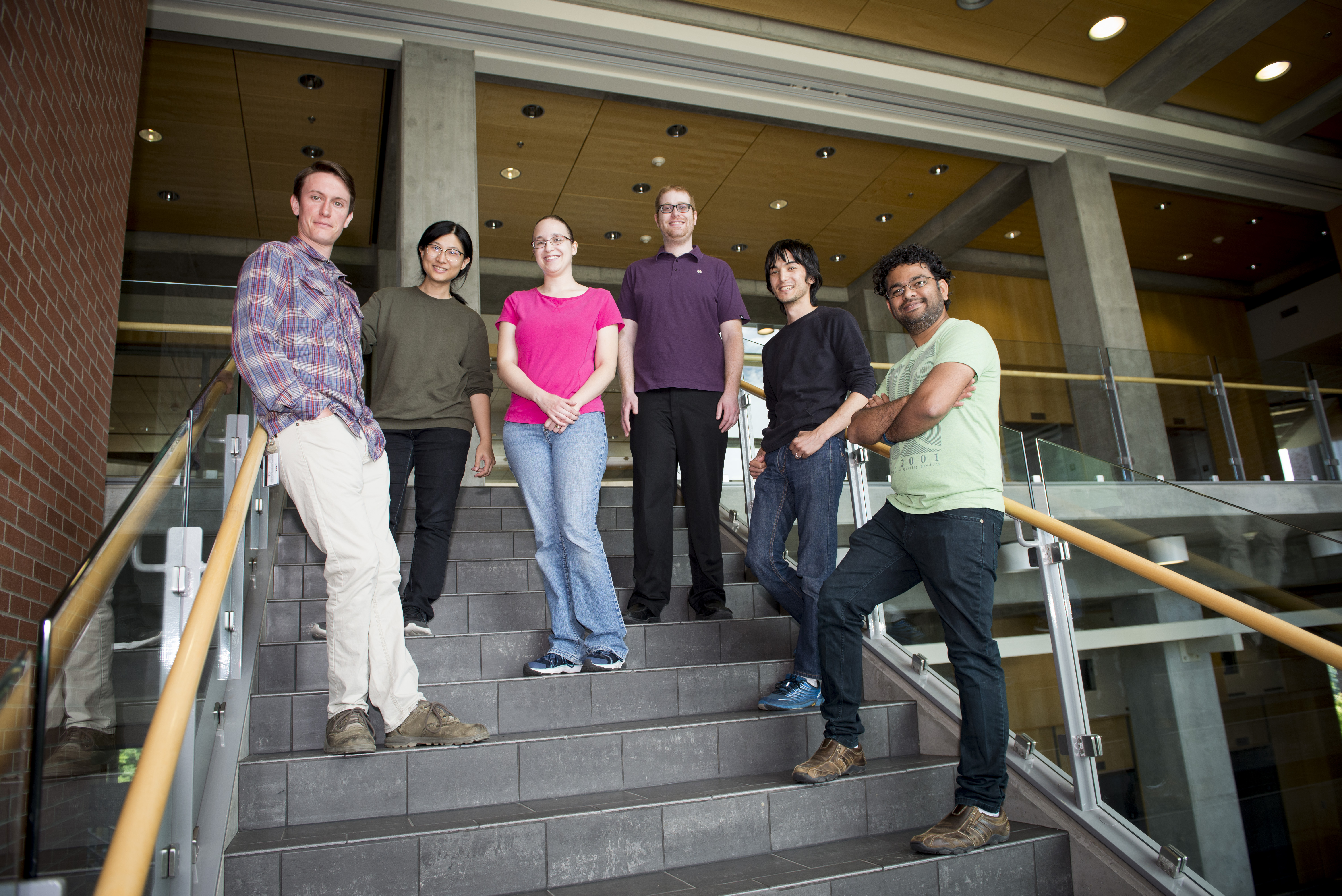Group of researchers smiling.