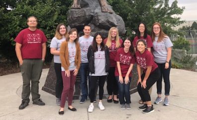 WSU lab students group picture in front of cougar statue