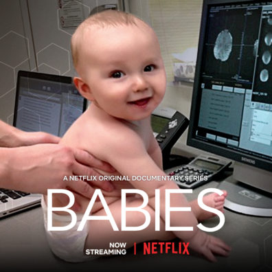 Baby sitting in a hospital desk area promoting Netflix show, Babies.