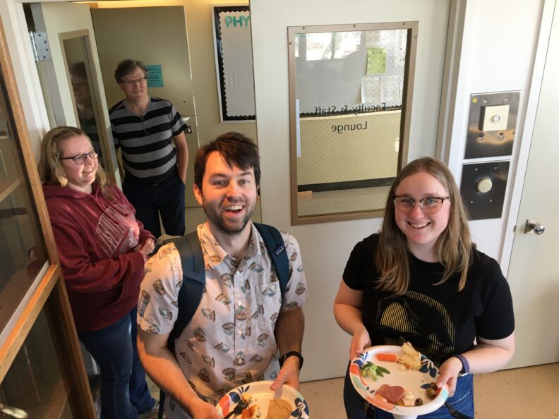Colby Schimelfenig at the celebration after passing his PhD defense