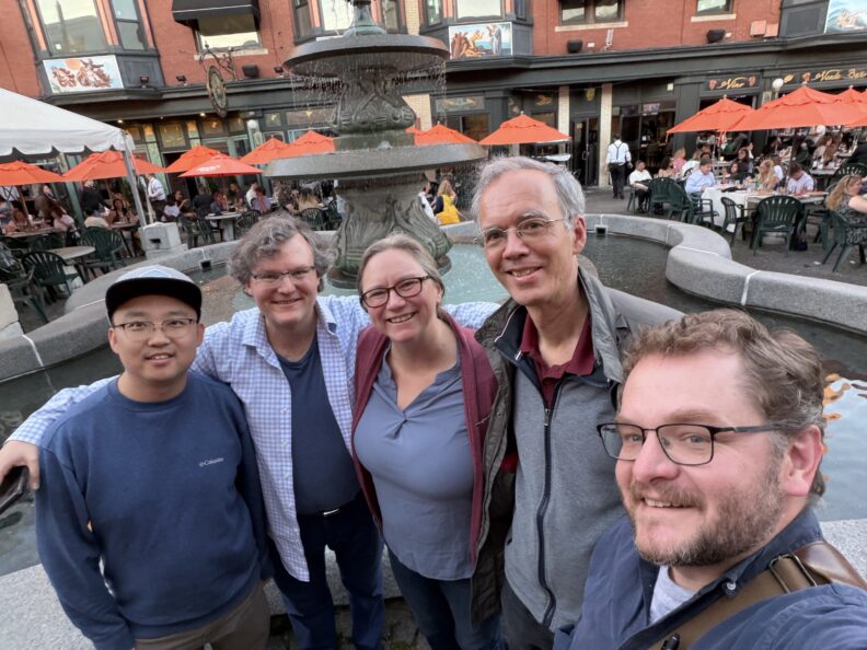 Photo of five PI's at the DAMOP meeting in Providence, RI, 2026.