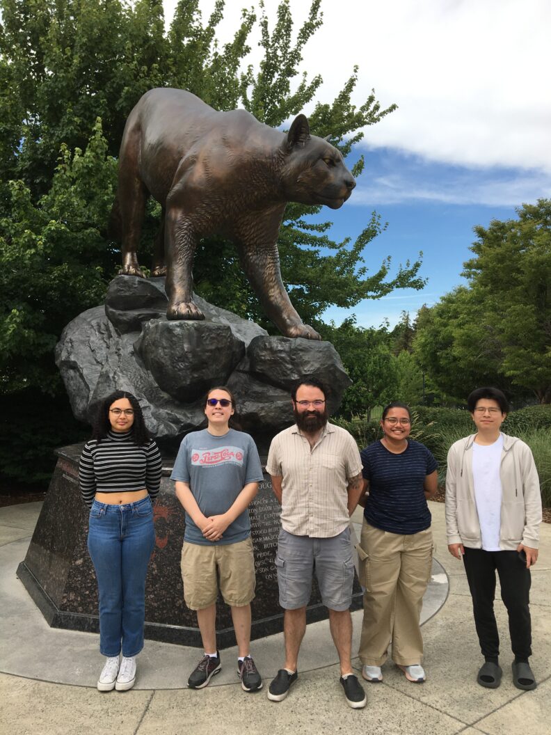 Photo of Brokke with Engels group at the Cougar on WSU campus