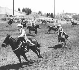 Students perform on their horses at Hilltop Stables arena.