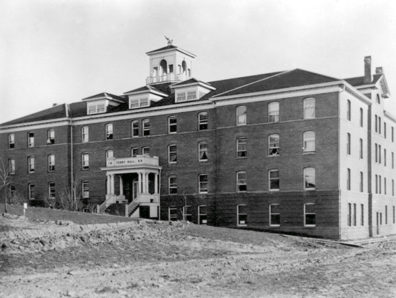 After a fire destroyed the original Ferry Hall dormitory in 1897, it was rebuilt three years later in the popular Georgian style, complete with columns, dentils, and a four-sided cupola. Photo WSU Manuscripts, Archives, and Special Collections.