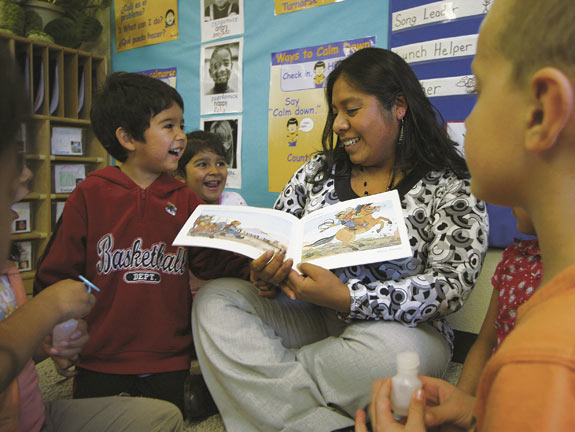 Sylvia Guzman with young readers