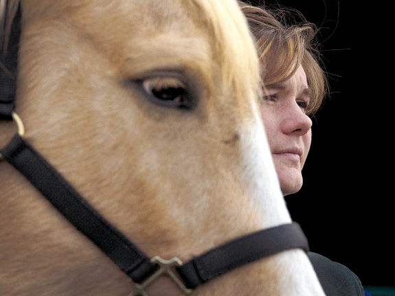 Alexis Campbell with a horse from a teaching herd