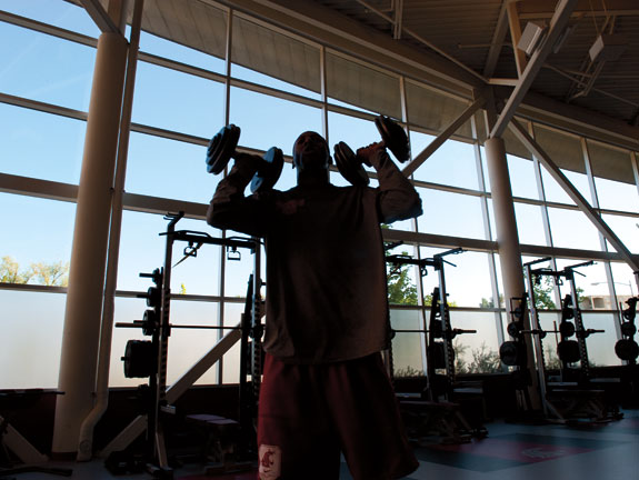 A student-athlete in the renovated weight room