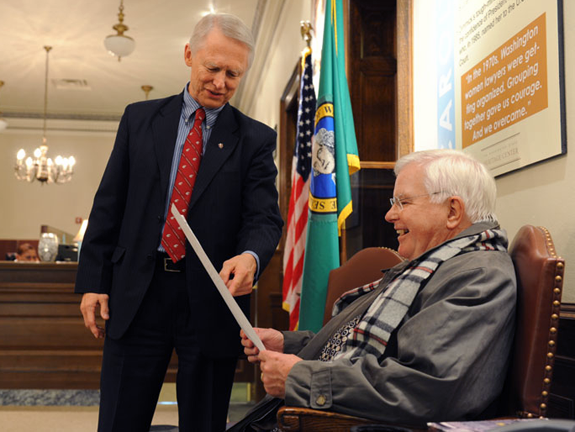 Secretary of State Sam Reed ’63, ’68 and State Rep. Sam Hunt ’67 reading their articles from 1966