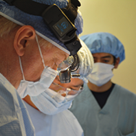 Mark Paxton doing surgery