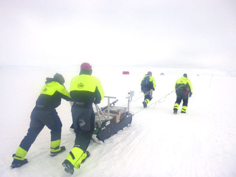 A team of scientists deploy instruments to study conditions in the Arctic in 2015.