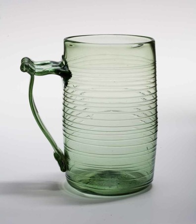 Glass cider and ale mug made by the Wistarburgh glass factory c. 1750s. Wistarburgh was the first successful glass factory in the colonies. From the Malcolm L. Polis Collection, courtesy Glass International.