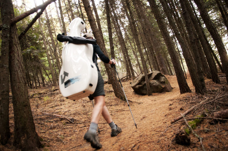 Ruth Boden hiking with her cello. Photo Zach Mazur.
