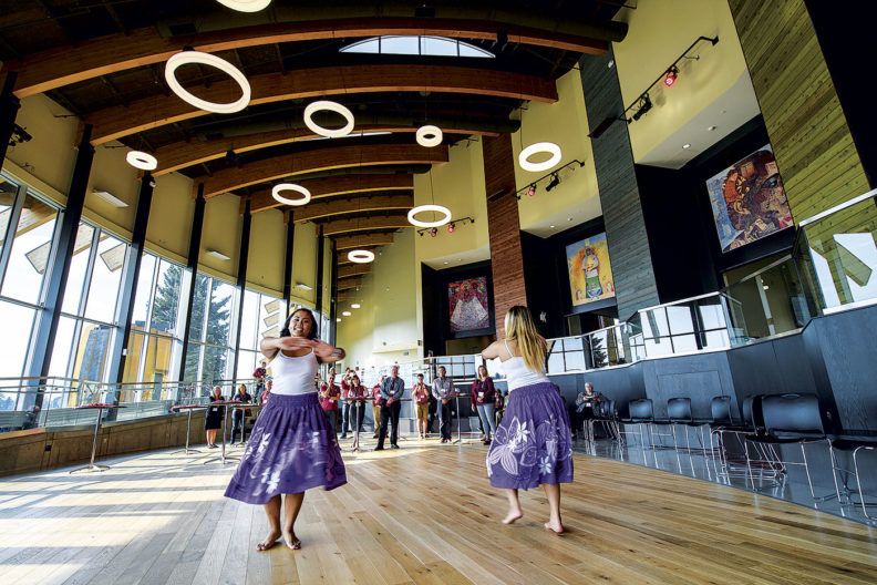 Student Hula dancers performing at the Crimson Table Event.